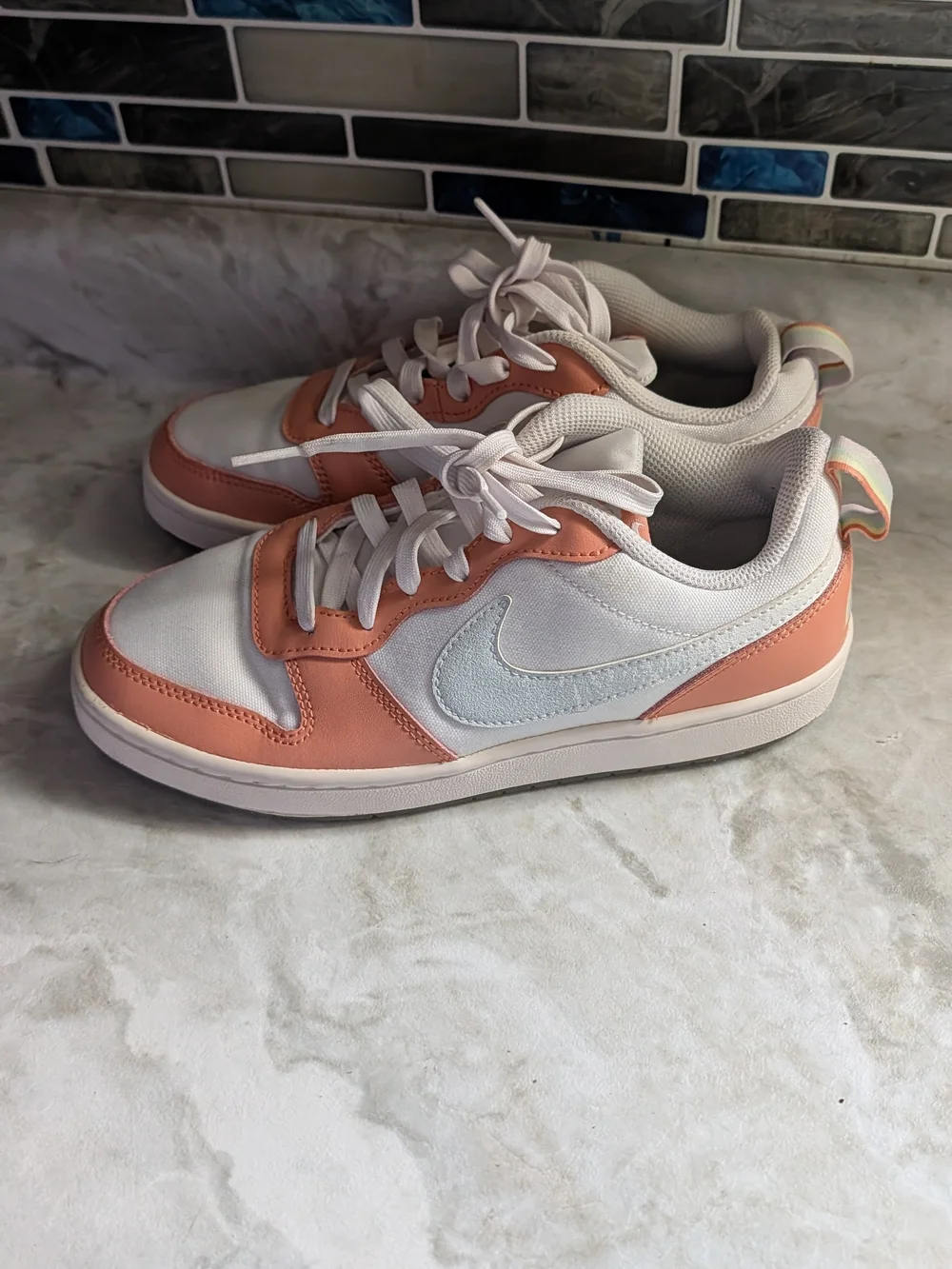 Nike Women’s Low-Top Sneakers in White and Peach